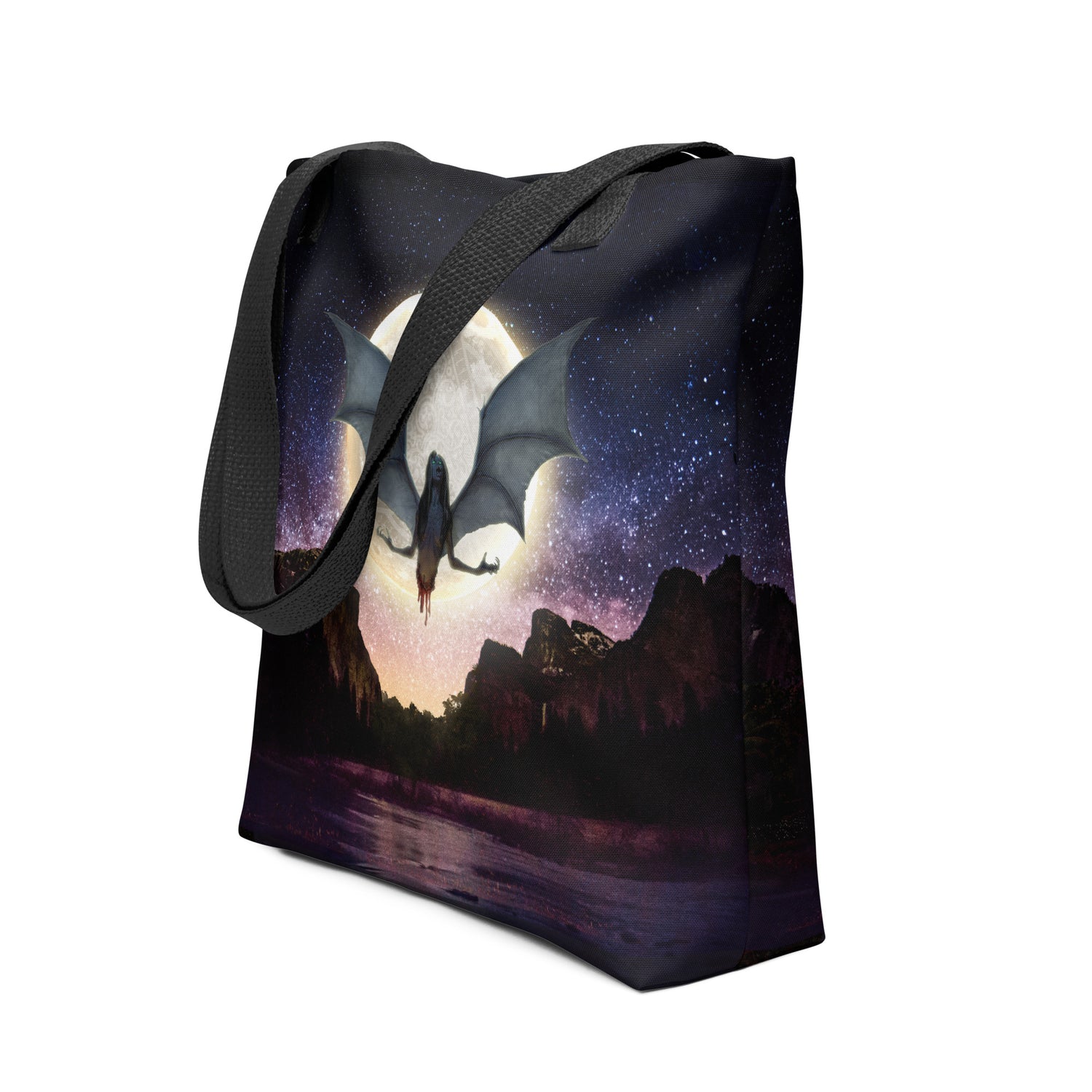 The Baby-Eater Manananggal tote bag featuring a dramatic design with a creature flying over a moonlit landscape.